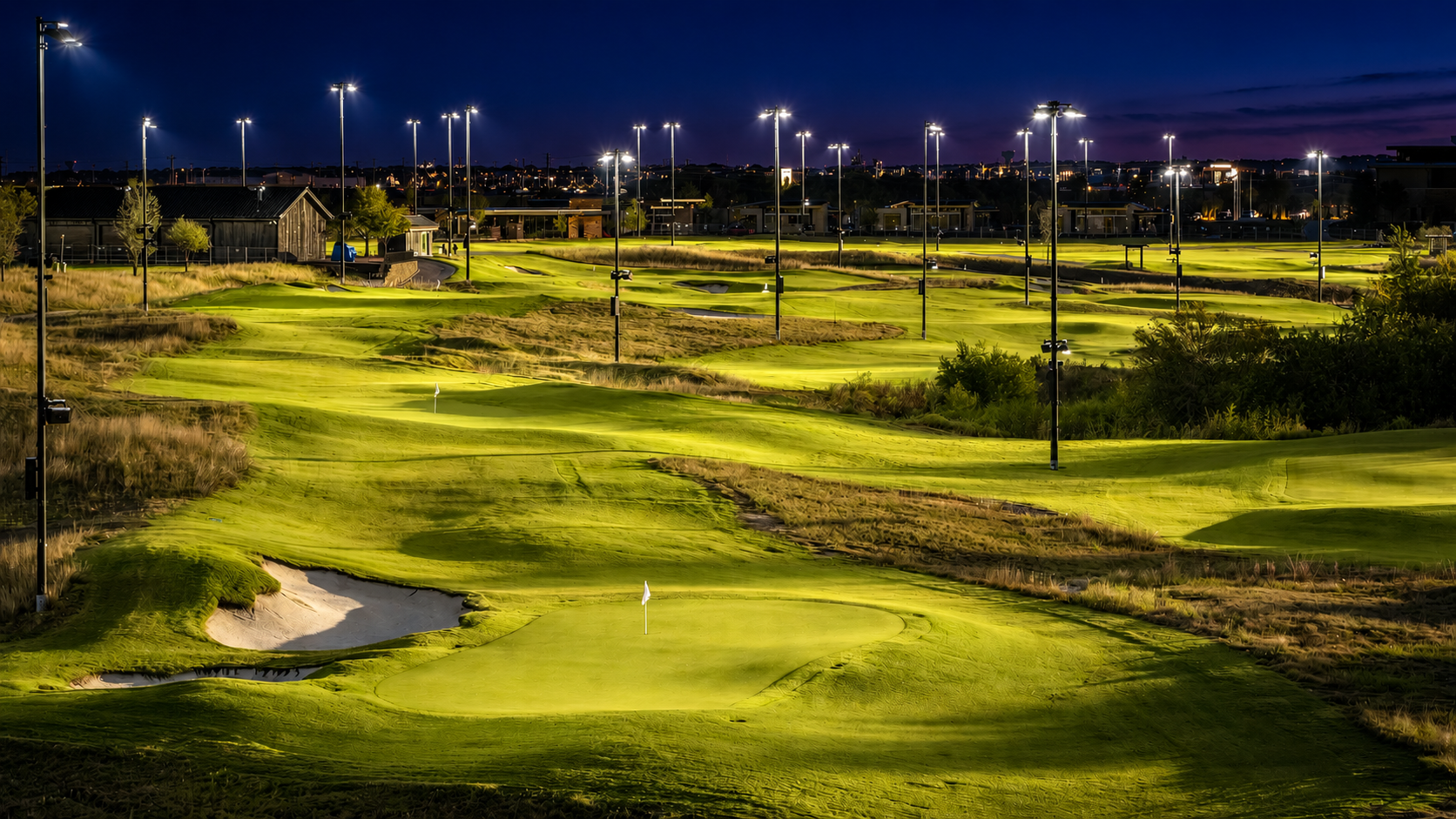 The Swing short course at Omni PGA Frisco lit for evening play