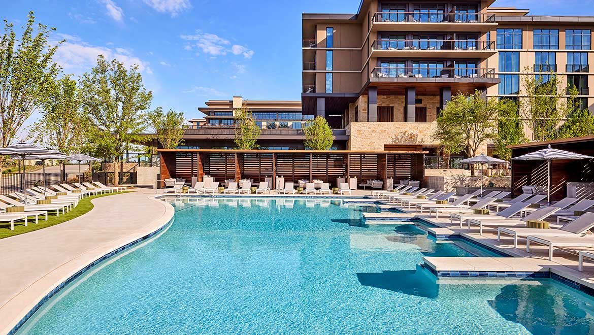 Leisure pool and cabana at Omni PGA Frisco Resort